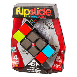 Flipslide handheld electronic game with colorful lights and blocks