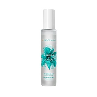 Moroccanoil Hair and Body Fragrance Mist bottle, a beauty-focused coworker gift for a refreshing scent.