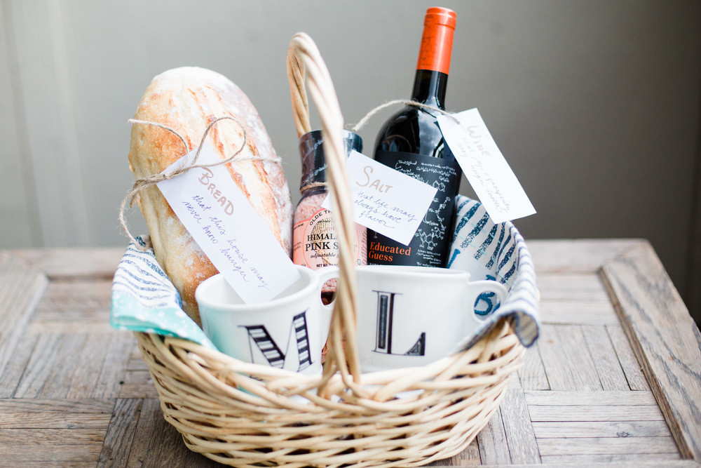 Close up of bread salt wine housewarming gifts