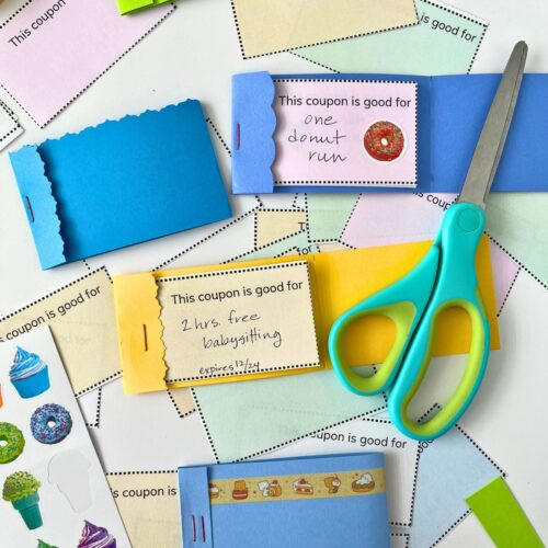 Image of multiple handmade coupon books, creative DIY gift idea