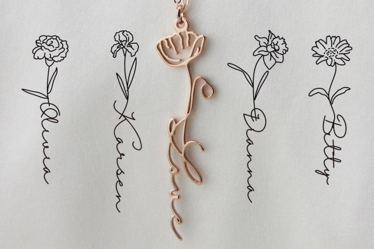 A close-up of a delicate name and birth flower necklace, a personalized and elegant bridesmaid gift suggestion.