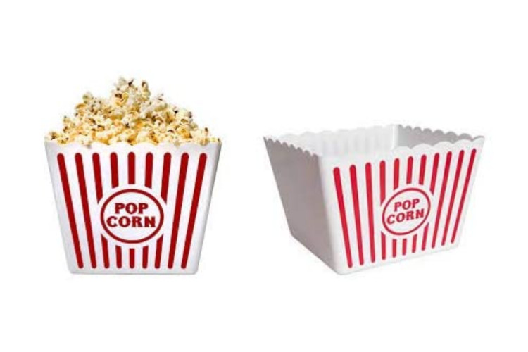 A movie night bucket filled with popcorn, candy, and drinks, a fun and themed bridesmaid gift bag idea.