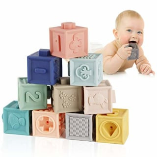 Mini Tudou soft building blocks in various colors and textures, showcasing safe teething toys and developmental blocks as versatile baby's first Christmas gifts.