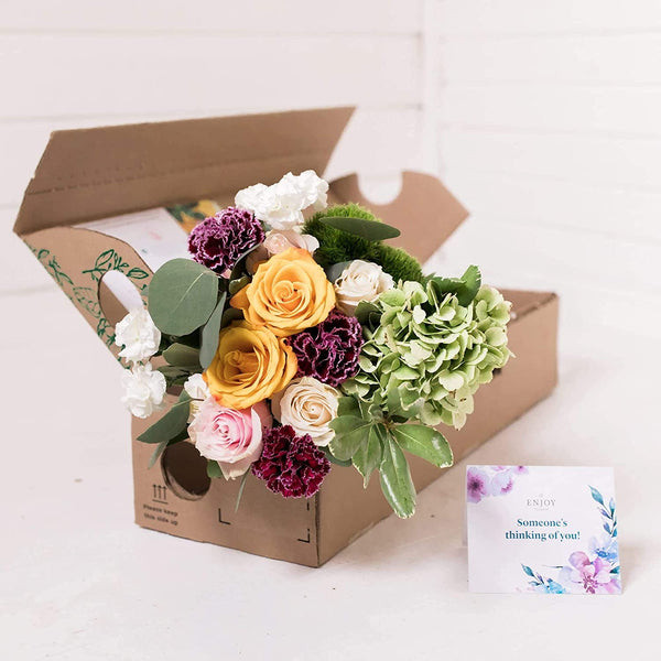 A vibrant floral bouquet subscription box, a romantic and recurring birthday gift idea for your wife.