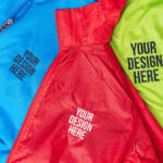 Close-up of embroidered logo on fabric, showcasing detail and quality, relevant to promotional apparel.