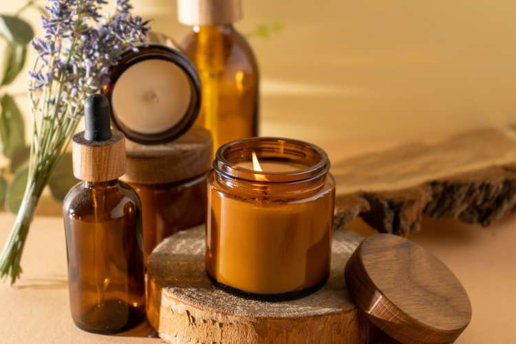 Luxury candles, a relaxation random birthday gift idea for wife, transforming spaces into tranquil sanctuaries with exquisite scents (via Canva)