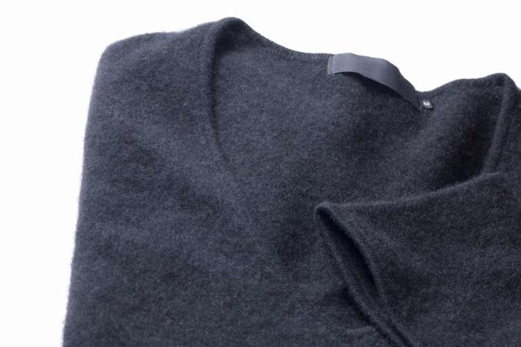 Cashmere sweater, a comfortable luxury birthday gift idea for wife, providing warmth, softness, and elegant style (via Canva)