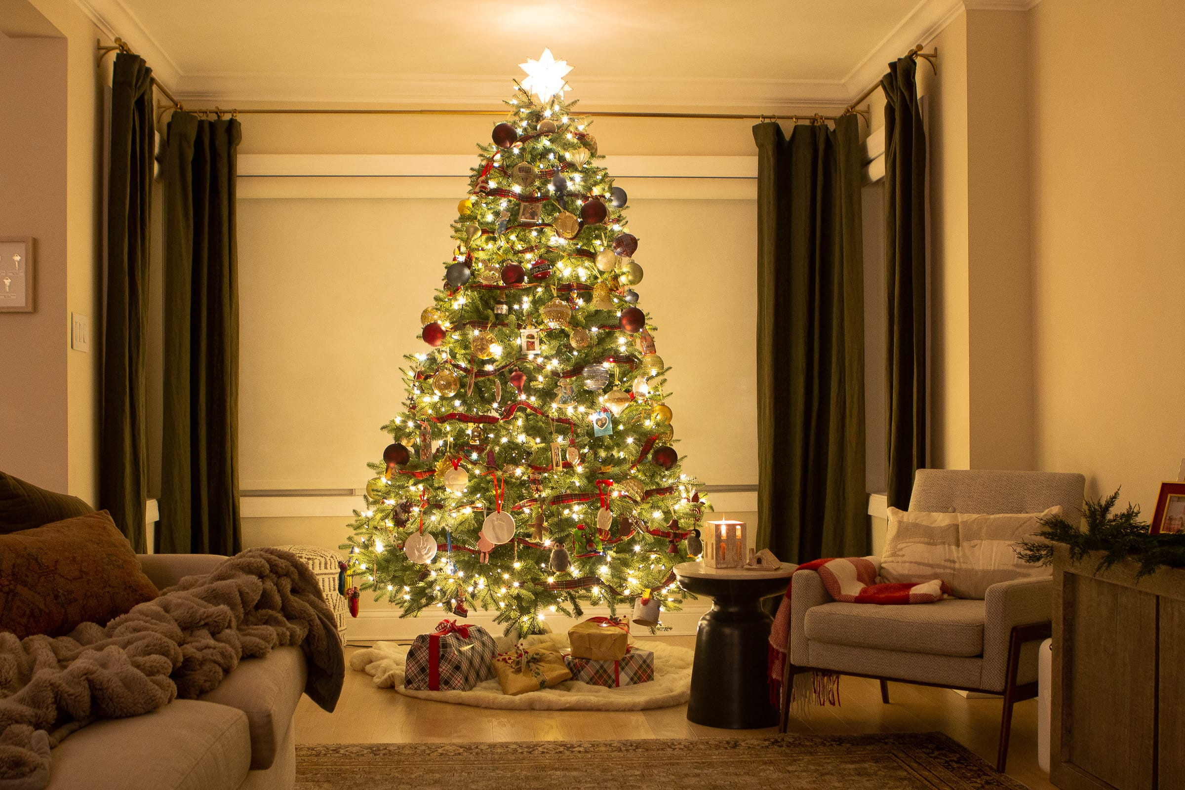 Elegant Christmas tree with beautifully wrapped gifts underneath