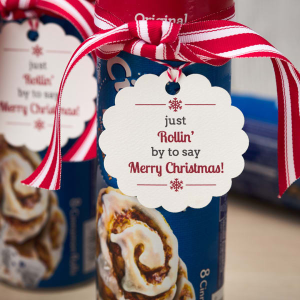 Punny cinnamon roll coworker gift tag is printed on Avery 80511 round scalloped tag. It reads, 