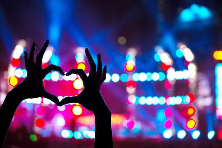 Concert or event tickets, an experiential random birthday gift idea for wife, creating shared excitement and lasting memories (via Canva)