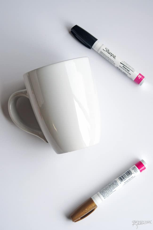 A charming and budget-friendly DIY Engagement Gift idea! Discover the simplicity of crafting personalized sharpie mugs as a heartfelt gesture. | thebewitchinkitchen.com
