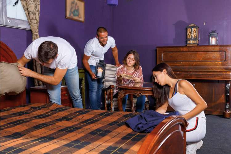 Escape room experience, an adventurous birthday gift idea for wife, promoting teamwork and puzzle-solving fun (via Canva)