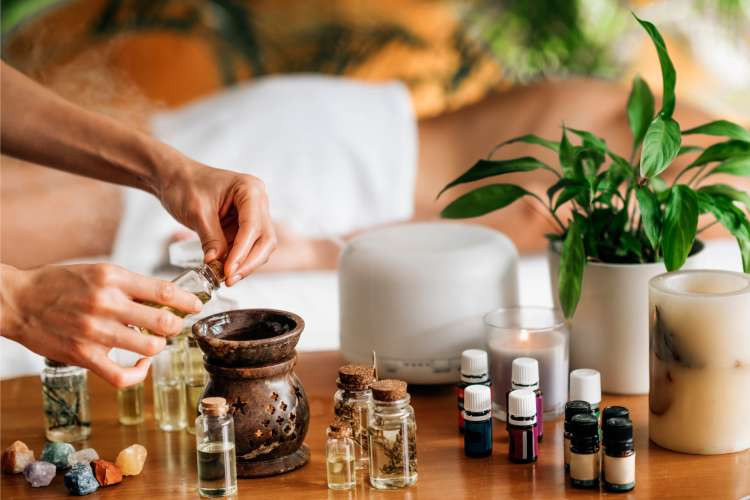 Essential oil diffuser, a relaxation birthday gift idea for wife, creating a calming atmosphere and promoting aromatherapy benefits (via Canva)