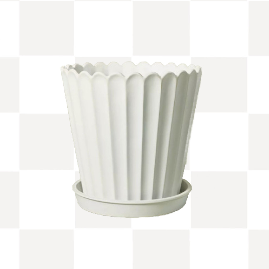 A scalloped planter, suggested as a thoughtful Mother's Day gift for plant-loving moms