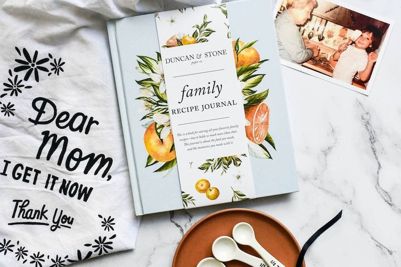 A family recipe book and keepsake journal, a sentimental and interactive gift.