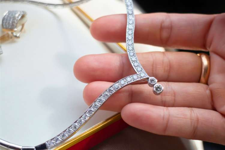 Fine diamond jewelry, a timeless luxury birthday gift idea for wife, symbolizing enduring love and commitment (via Canva)
