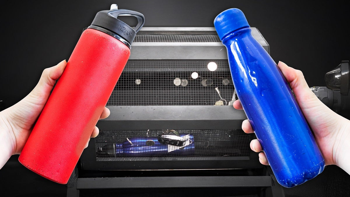 Hands holding a clear tumbler filled with water, demonstrating durability and leak-proof quality in drinkware.