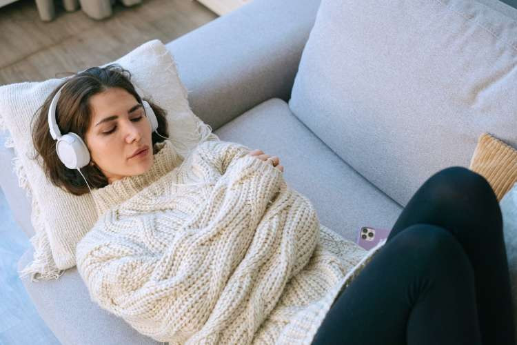 Noise-canceling headphones, a tech birthday gift idea for wife, providing peaceful escapes and immersive audio experiences (via Canva)