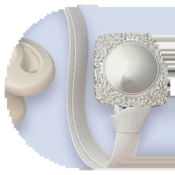 Engraved Silver Pacifier Clip from HelloMelonBug, a unique and personalized baptism gift, a keepsake that can be treasured for years.