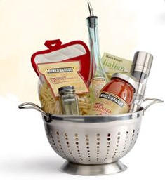 Pizza gift basket with sauce, toppings, and a pizza cutter