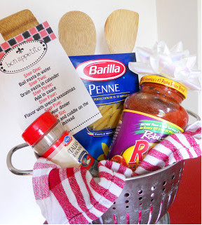 Asian gift basket with bamboo steamer, chopsticks, and tea cups