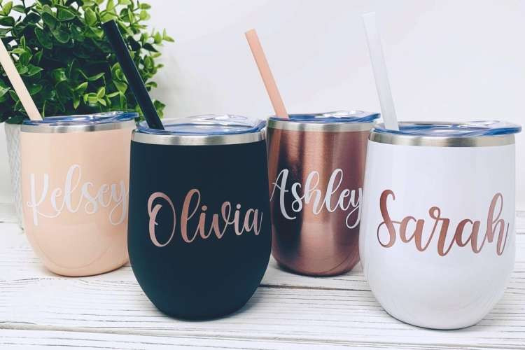 Personalized stemless wine tumblers, a practical and customizable bridesmaid gift idea.