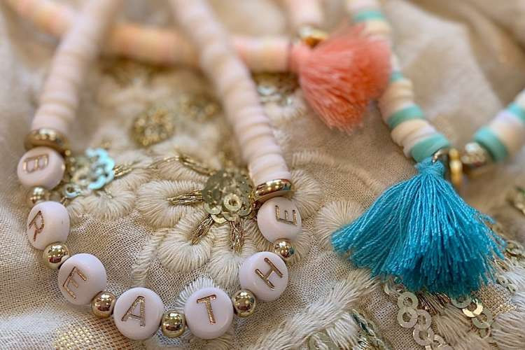 Handmade beaded bracelets, showcasing a DIY and personal bridesmaid gift idea.