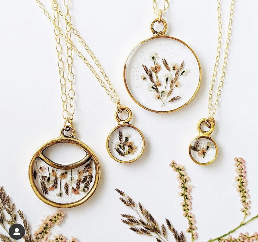 A delicate necklace from Gracefully Wrapped, symbolizing a meaningful and personalized 1st Mother's Day gift idea.