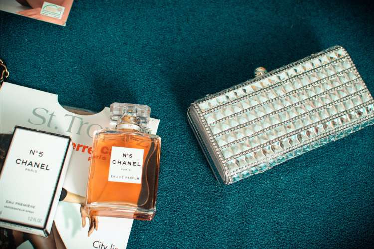 Luxury perfume, a sophisticated birthday gift idea for wife, offering a signature scent and everyday indulgence (via Canva)