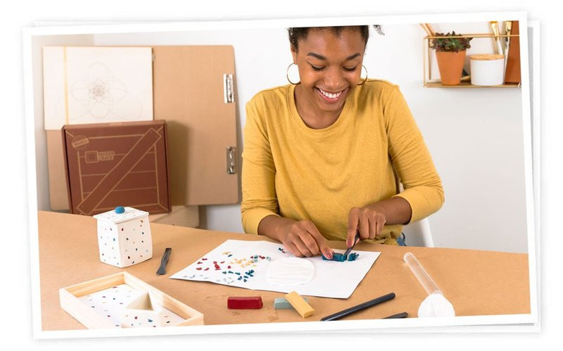 A craft box, representing the gift of creative experiences and hands-on activities.