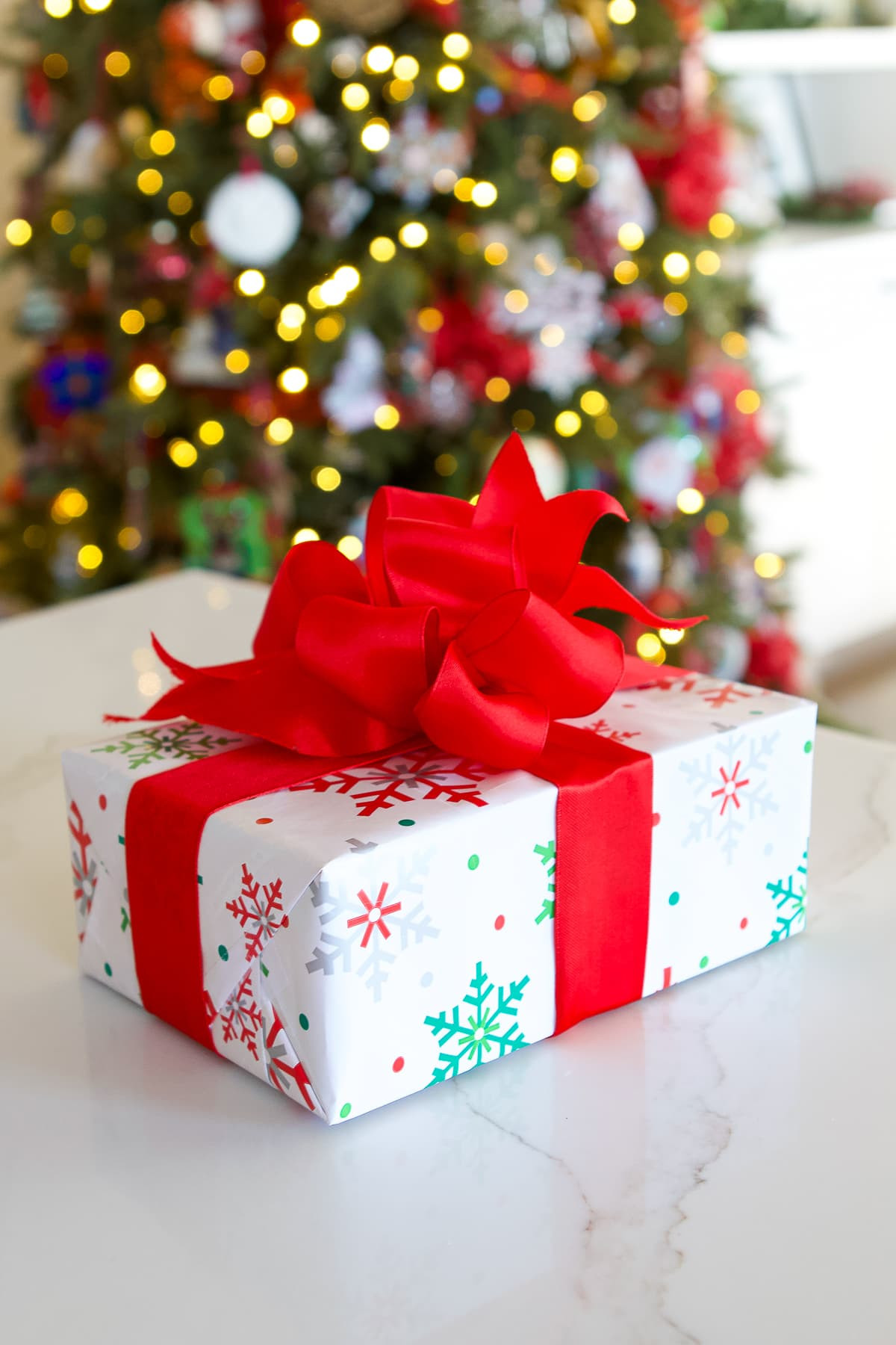 Example of a perfectly wrapped Christmas present with a handmade bow