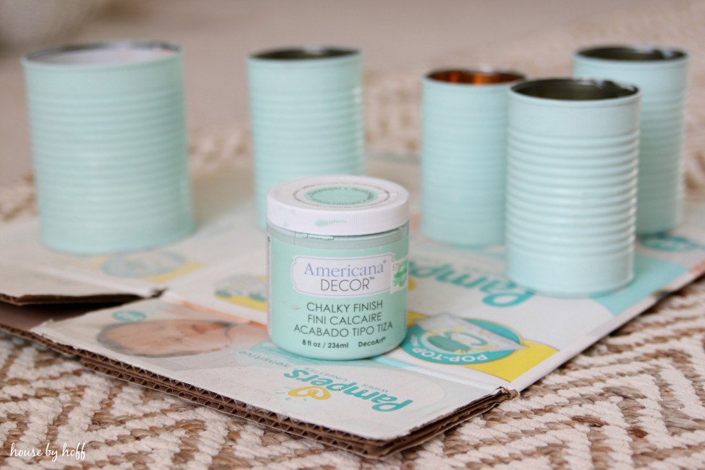 Step-by-step guide to creating painted tin can Mother's Day gifts with chalk paint and decorative elements