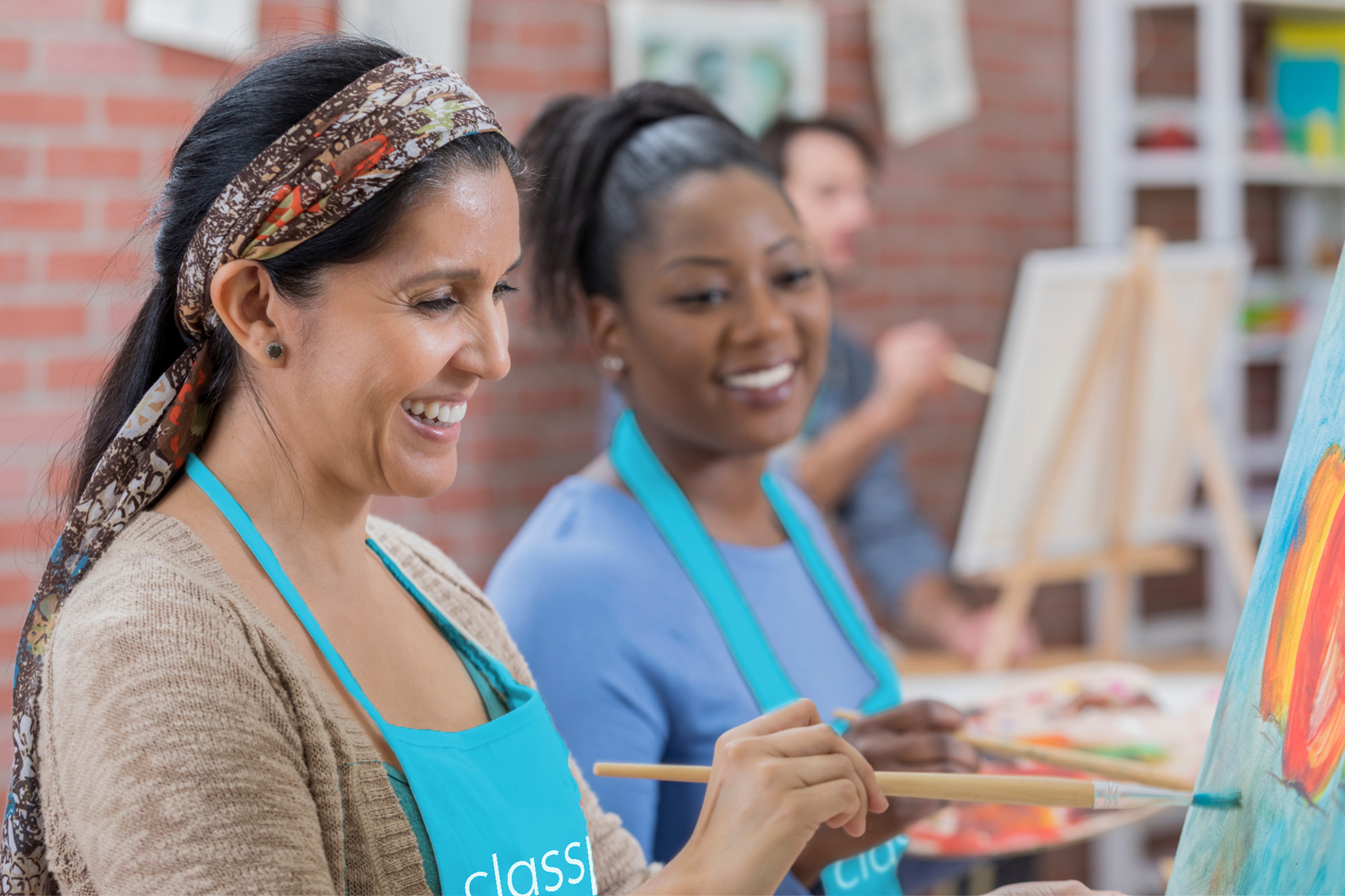Women enjoying a painting class, a creative birthday gift idea for wife (via Classpop!)