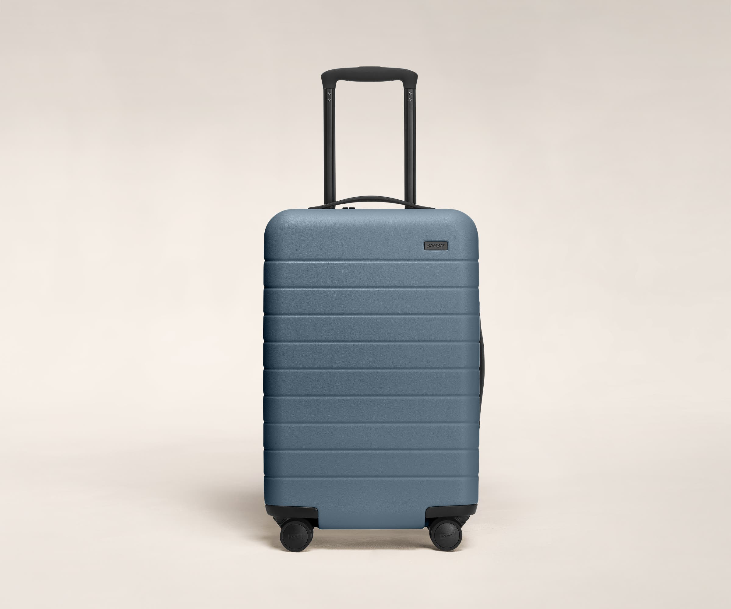 Away Carry-On Suitcase, a stylish and durable birthday gift for dads who love to travel in style