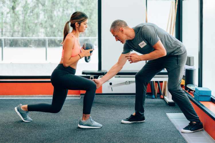 Personal trainer session, a personalized wellness birthday gift idea for wife, supporting fitness goals and providing expert guidance (via Canva)