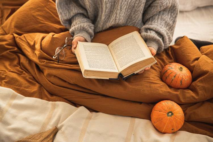 Personalized blanket, a comforting birthday gift idea for wife, wrapped in warmth and personal touches (via Canva)
