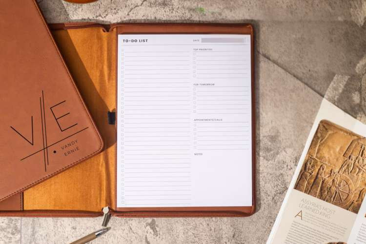Personalized planner, an organizational birthday gift idea for wife, helping manage schedules and goals (via Etsy)
