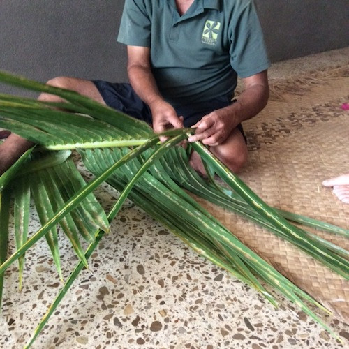 Basket weaving demonstration in progress