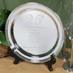 Elegant 25th anniversary silver plate featuring customizable engraving for names and date, perfect for home decor.