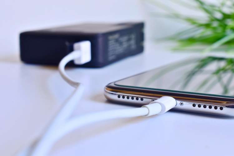Portable charger, a practical tech birthday gift idea for wife, ensuring devices stay powered up on the go (via Canva)