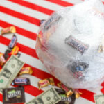Saran Wrap Ball Game ready to be played, showcasing its tightly wrapped layers and promising hidden prizes.