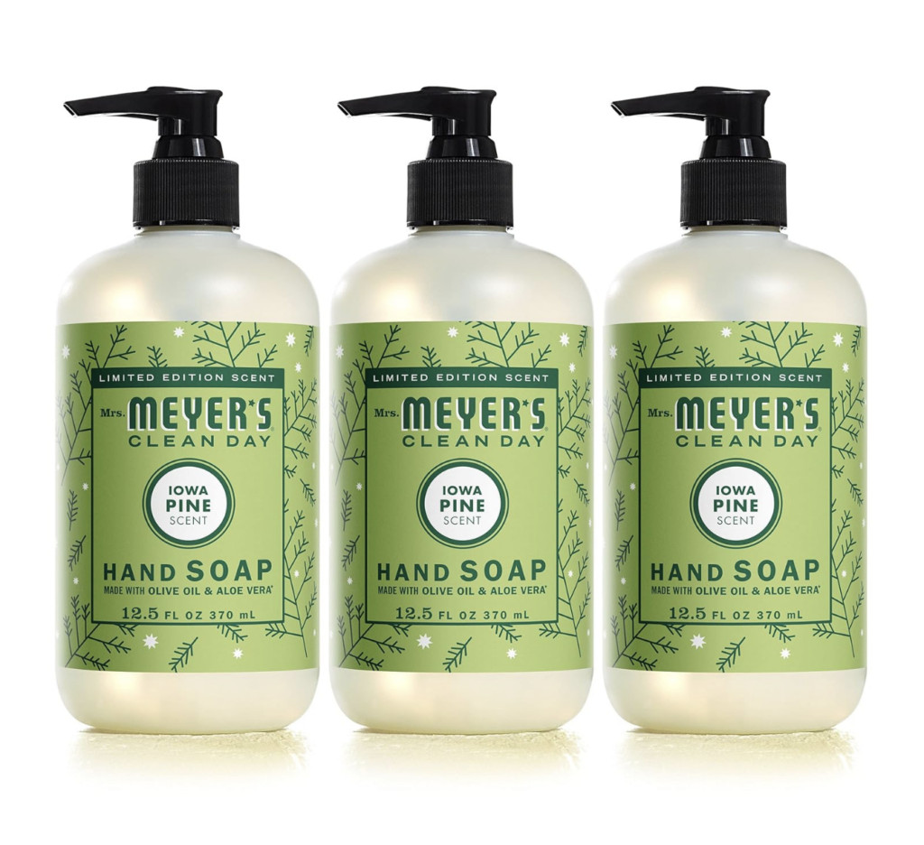 Bottles of Mrs. Meyer's seasonal hand soap in festive scents, ideal for a practical and fragrant gift