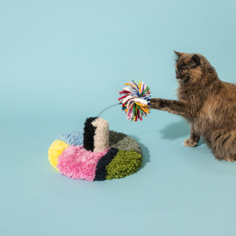 Cat Haus Carousel Cat Scratcher in vibrant colors, a colorful gift for cat owners