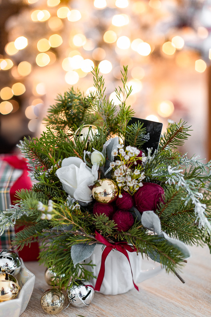 Overhead view of the small Christmas flower arrangement gift card holder, displaying the arrangement's delicate and handmade charm as a perfect small Christmas gift