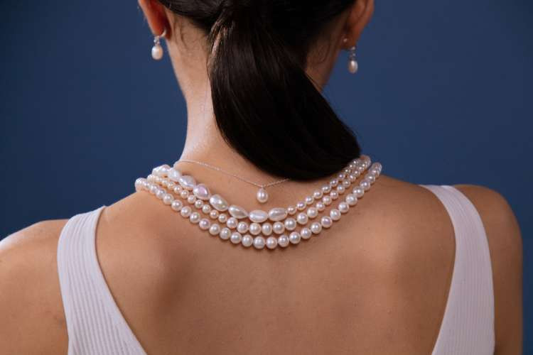 Statement necklace, a bold fashion birthday gift idea for wife, elevating outfits and expressing personal style (via Canva)