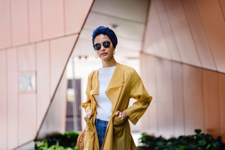 Stylish sunglasses, a fashionable birthday gift idea for wife, protecting eyes and adding flair to any look (via Canva)
