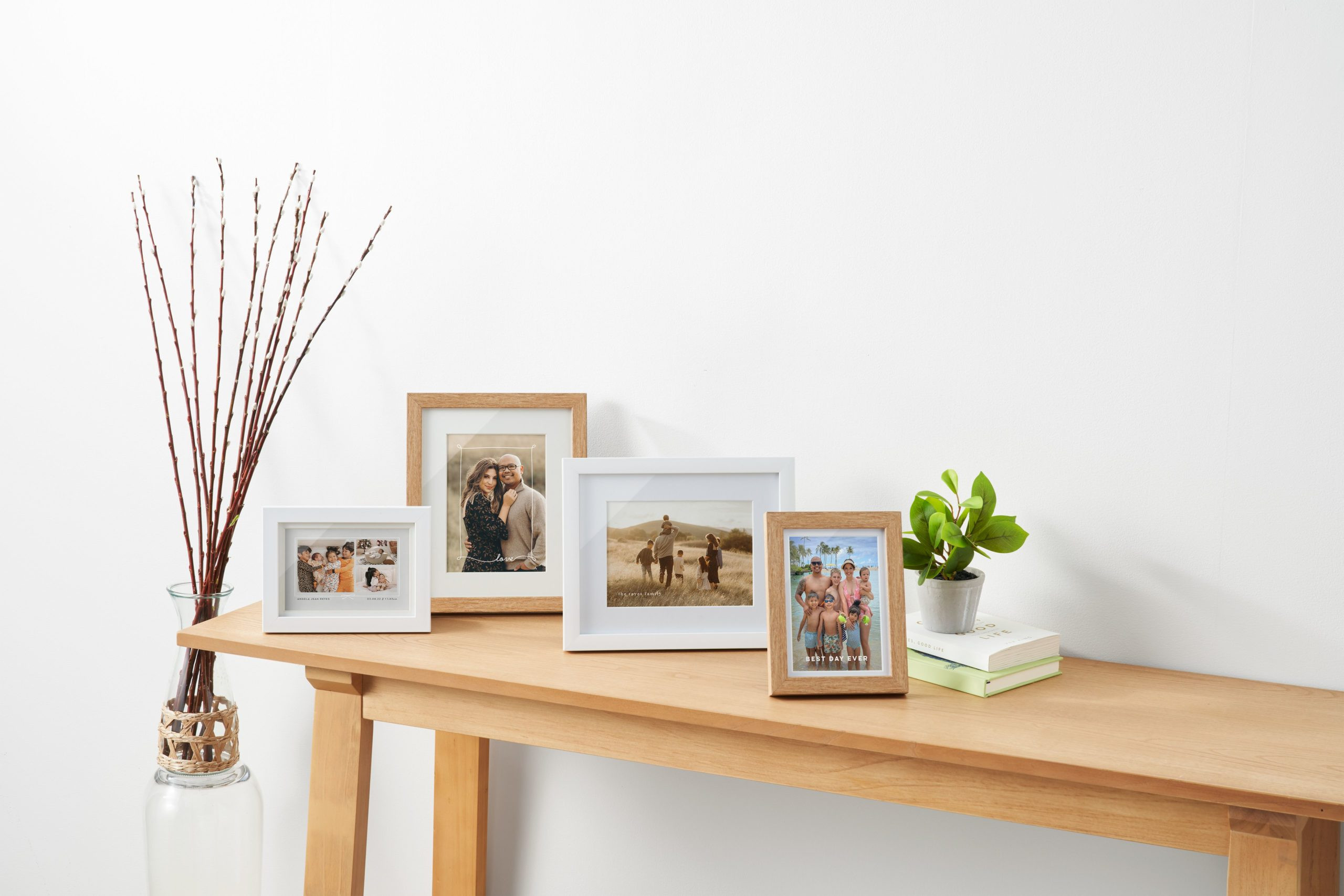 A group of Shutterfly tabletop photo prints in various sizes, ideal for displaying memories on desks and shelves.