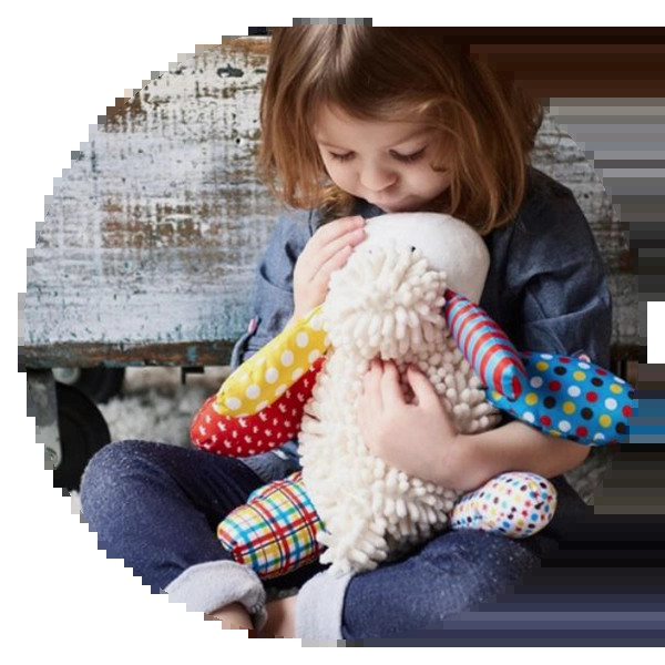 Louie The Lamb Prayer Buddy from The Catholic Company, an interactive and comforting baptism gift to help children learn prayers.