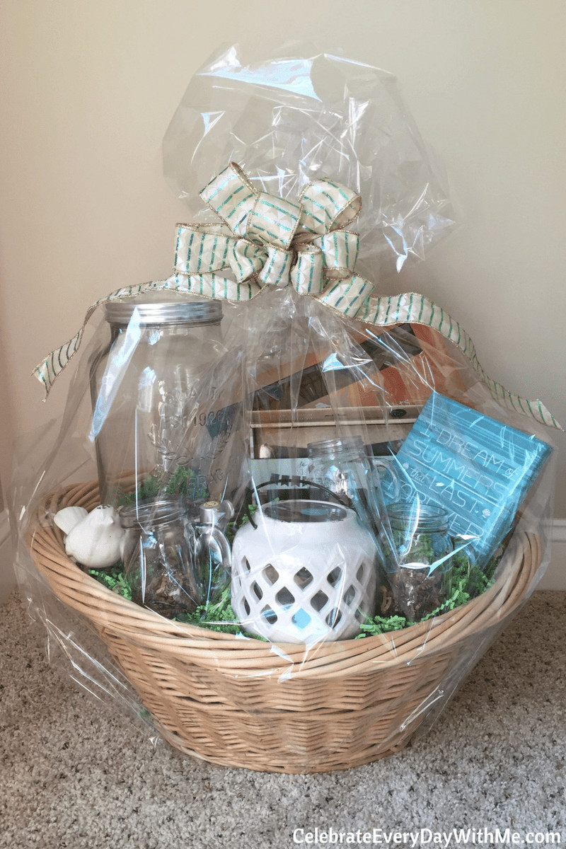 Basket filler inside glass mugs in a gift basket, adding visual depth and interest