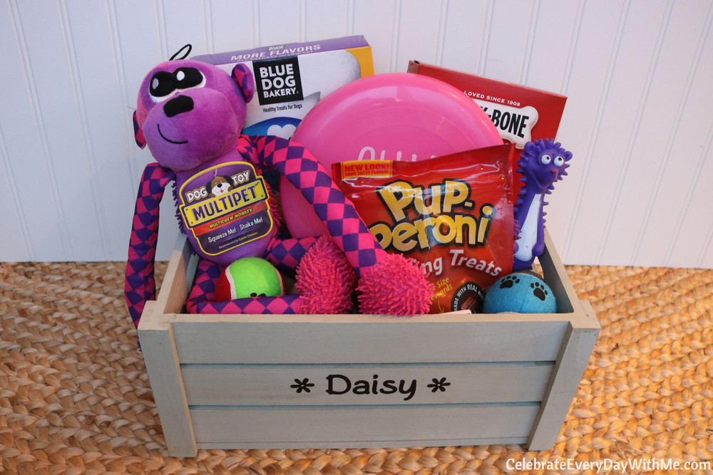 New pet gift basket with dog toys and supplies, a thoughtful gift for new pet owners